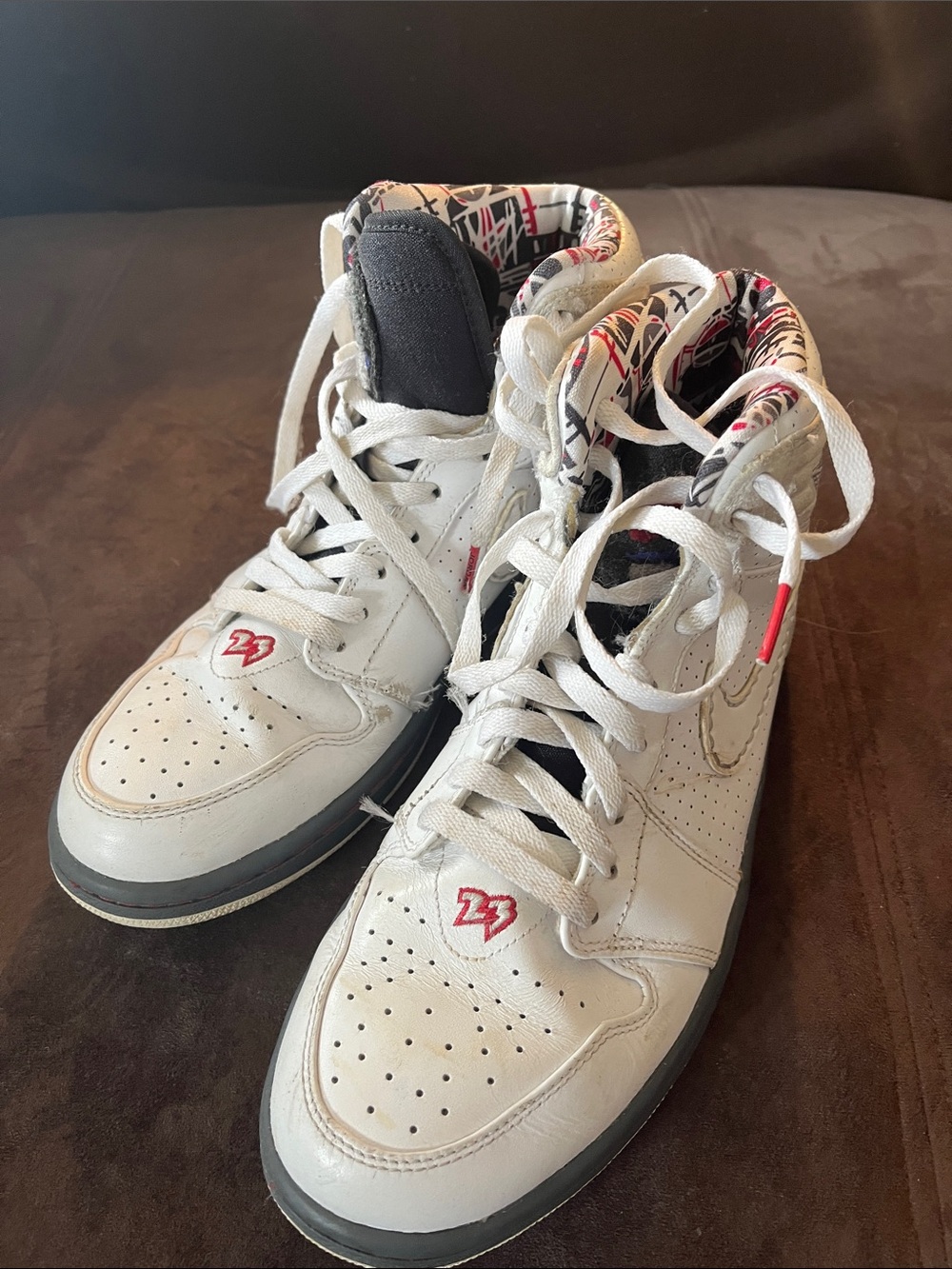 Nike White High-Top Sneakers with Black Trim
